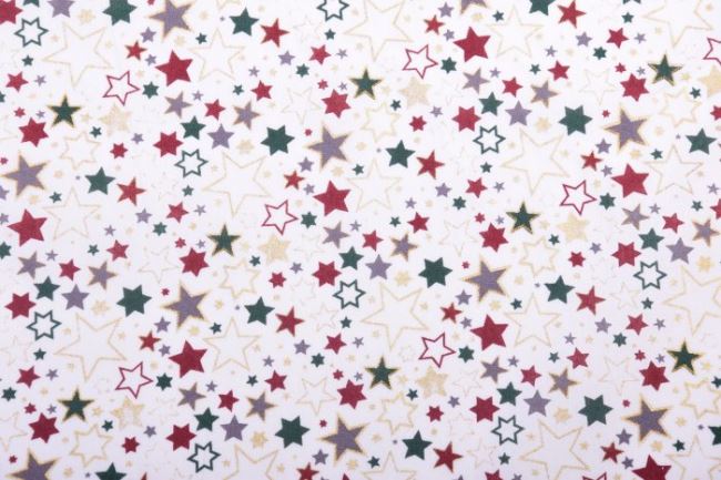 Tkanina bawełniana świąteczna biała z nadrukiem kolorowych gwiazdek 12714/025