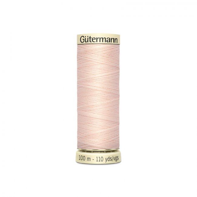 Uniwersalna nić do szycia  Gütermann w kolorze beżowo-różowym 210