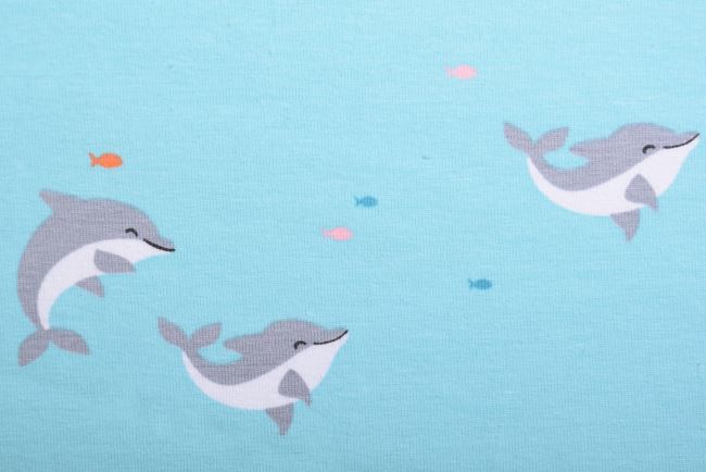 Dzianina bawełniana miętowa z nadrukiem delfinów 19578/022