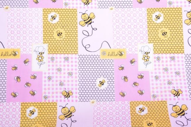 Tkanina bawełniana różowa z nadrukiem pszczół i plastrów miodu 11125/011