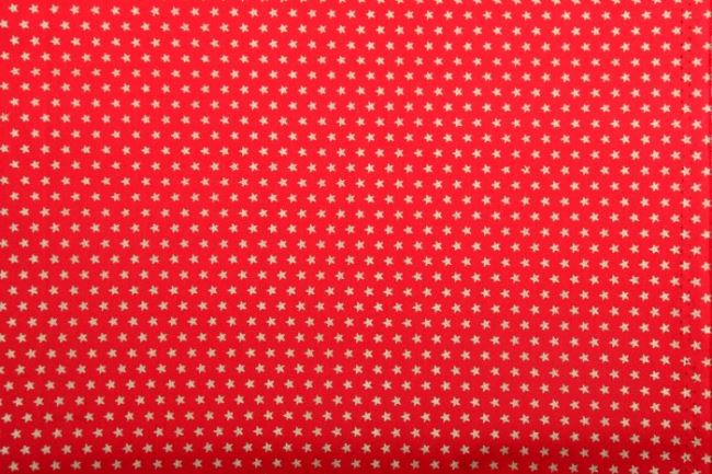 Świąteczna tkanina bawełniana czerwona z drobnymi gwiazdkami 12702/015