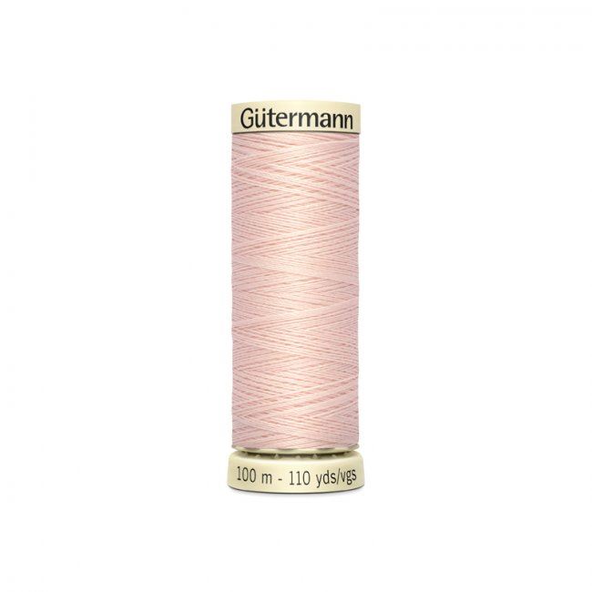 Uniwersalna nić do szycia  Gütermann w kolorze beżowo-różowym 658