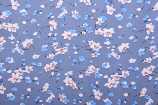 Tkanina bluzkowa niebieska z nadrukiem kwiatów 11440/003