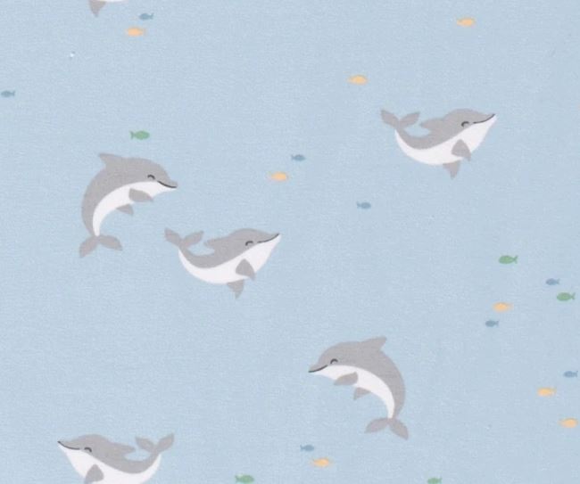 Dzianina bawełniana w kolorze jasnoniebieskim z nadrukiem delfinów 19578/003