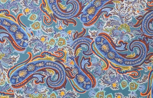 Tkanina wiskozowa niebieska z nadrukiem ornamentów 19780/635