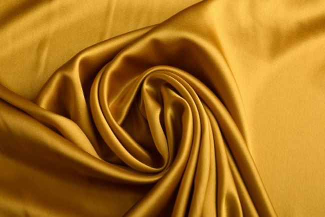 Jedwab elastyczny w kolorze złotym 0880/570
