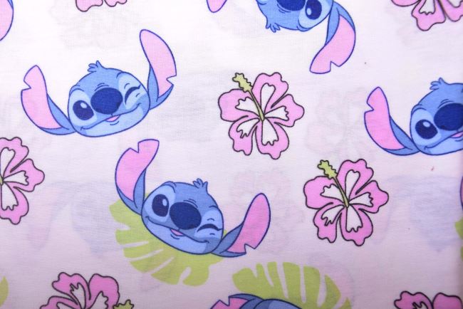 1 m dzianiny bawełnianej w kolorze białym z postacią z bajki Stitch DS-KUP147