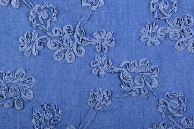 Dżins niebieski z bordiurą i plastycznym wzorem kwiatów 13005/008