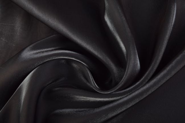 Luskusowa błyszcząca tkanina w kolorze czarnym 16597/999